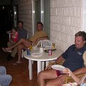 AUS QLD Mareeba 2003APR18 005  Greg and Grace McClure (Lisa's husband and daughter) with Fluxy, Rain Man and Jenny on the verandah of our hotel in Mareeba. : 2003, April, Australia, Date, Events, Flux - Trevor & Sonia, Mareeba, Month, Places, QLD, Wedding, Year
